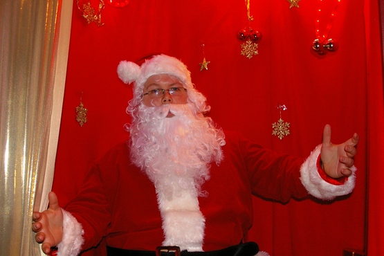 Santa in his grotto at Pomegranate Boutique